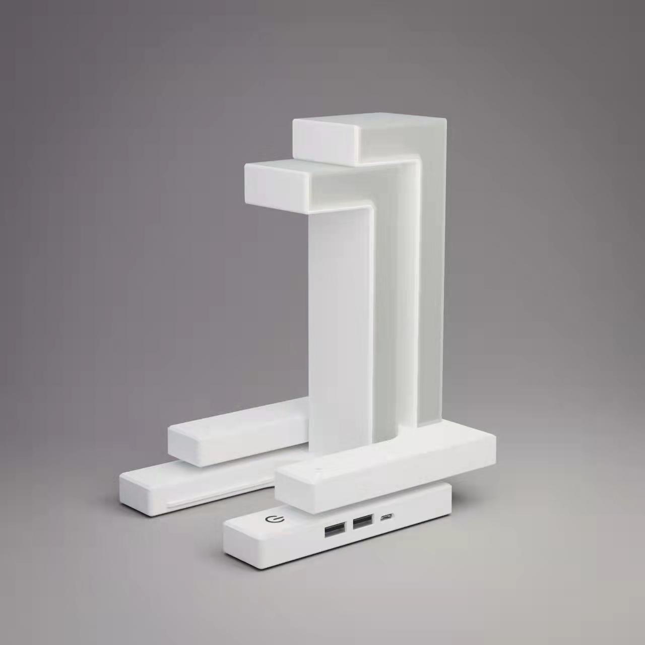 Modern white lamp with USB ports.